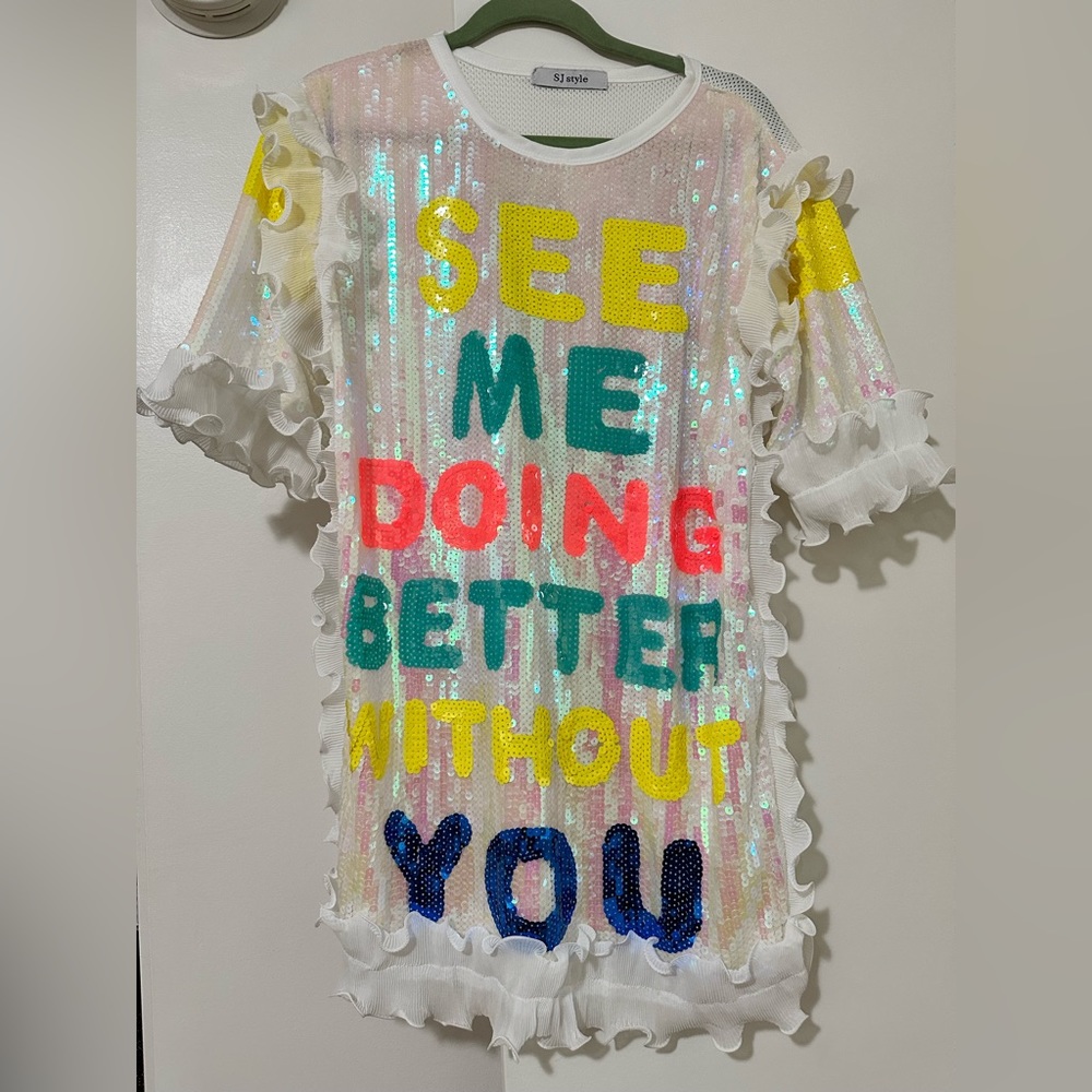Party dress “see me doing better than you”
